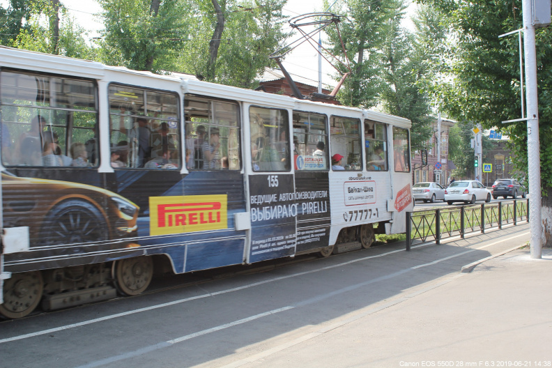 Трамвай № 155 едет по улице Декабрьских Событий