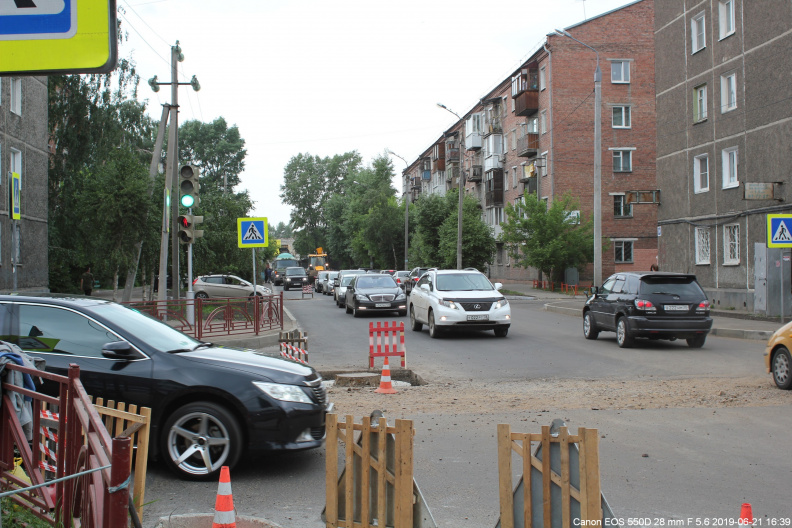 Улица Подаптечная. Ремонт колодца